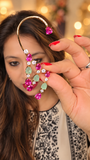 Pink and mint-green ear-cuff earring with a curved gold-tone upper hook