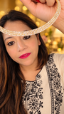 Three-row sparkling American Diamond hasli necklace in a gold-tone finish