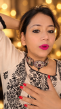 Victorian-finish multicolor tiger choker worn with matching statement earrings